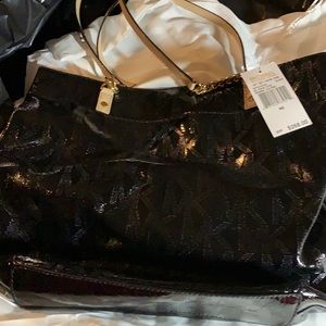 Michael Kors black patent leather handbag